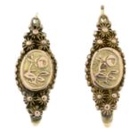 A pair of early 20th century cultured pearl earrings and a pair of filigree earrings.One stamped