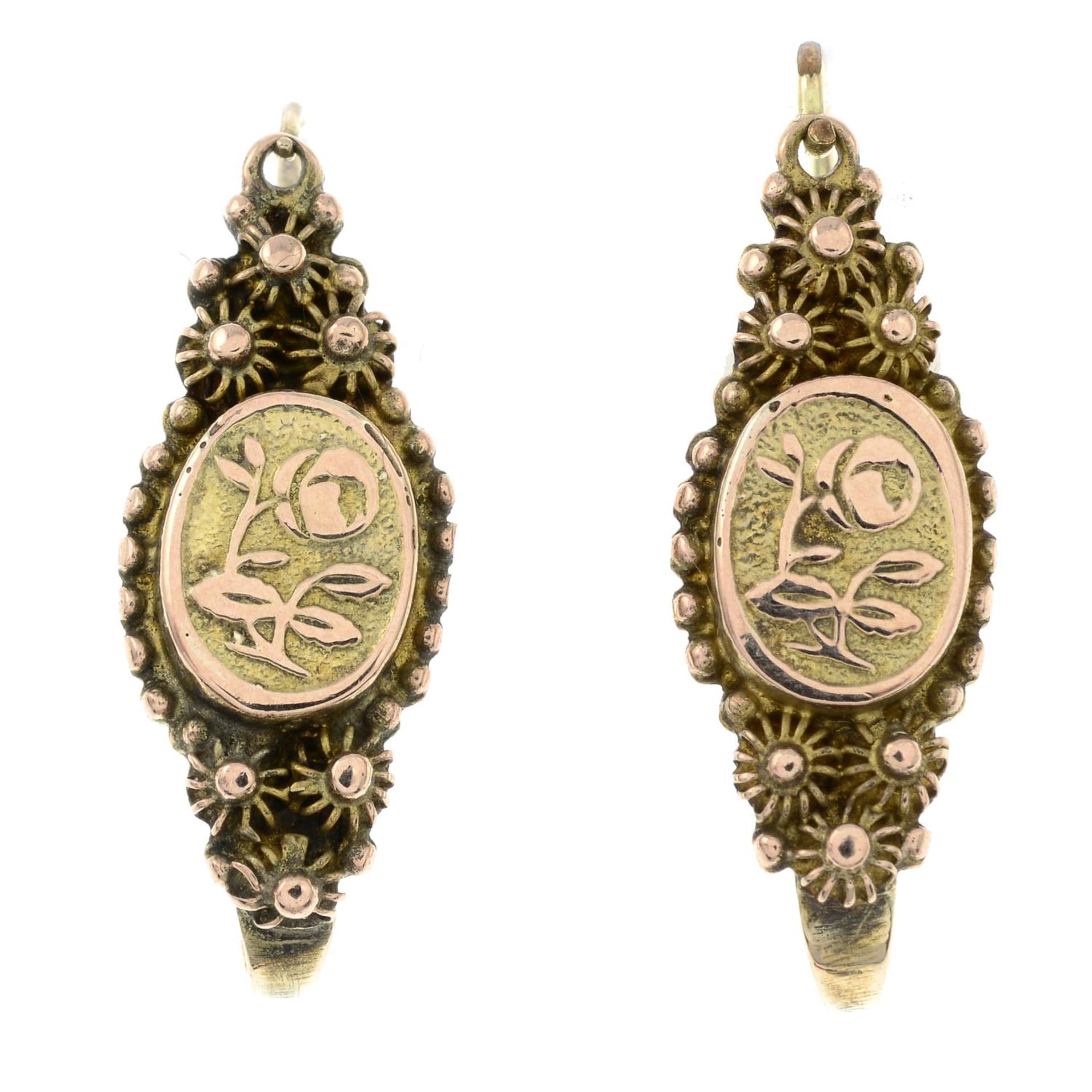 A pair of early 20th century cultured pearl earrings and a pair of filigree earrings.One stamped