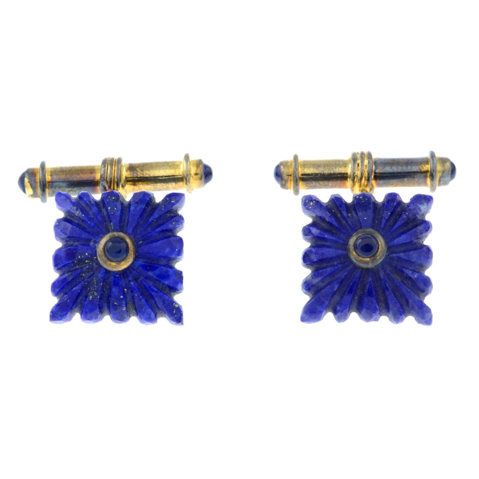 A pair of lapis lazuli cufflinks.Stamped 925.Length of cufflink face 1.4cms 9.1gms.