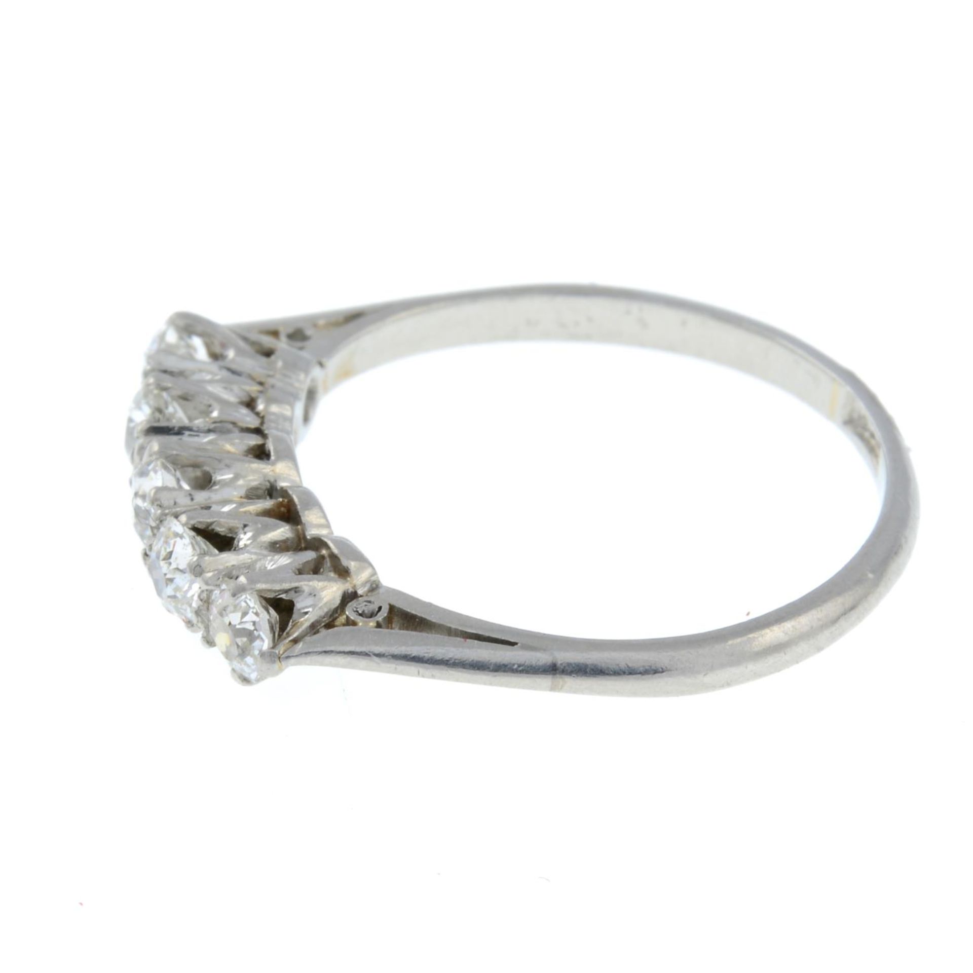 A five stone diamond ring.Estimated total diamond weight 0.19cts, - Image 2 of 3