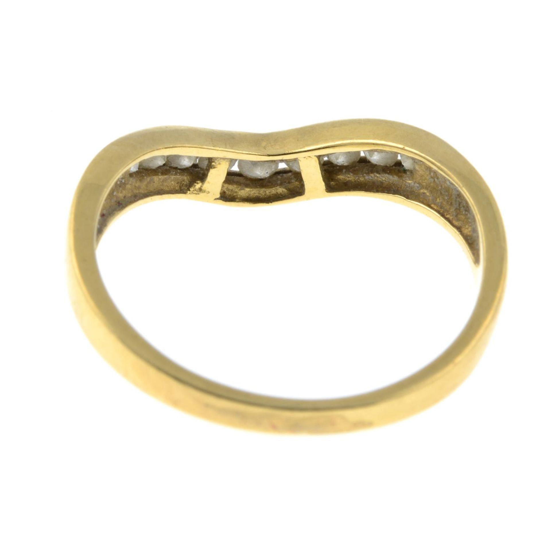 An 18ct gold diamond wishbone ring. - Image 3 of 3