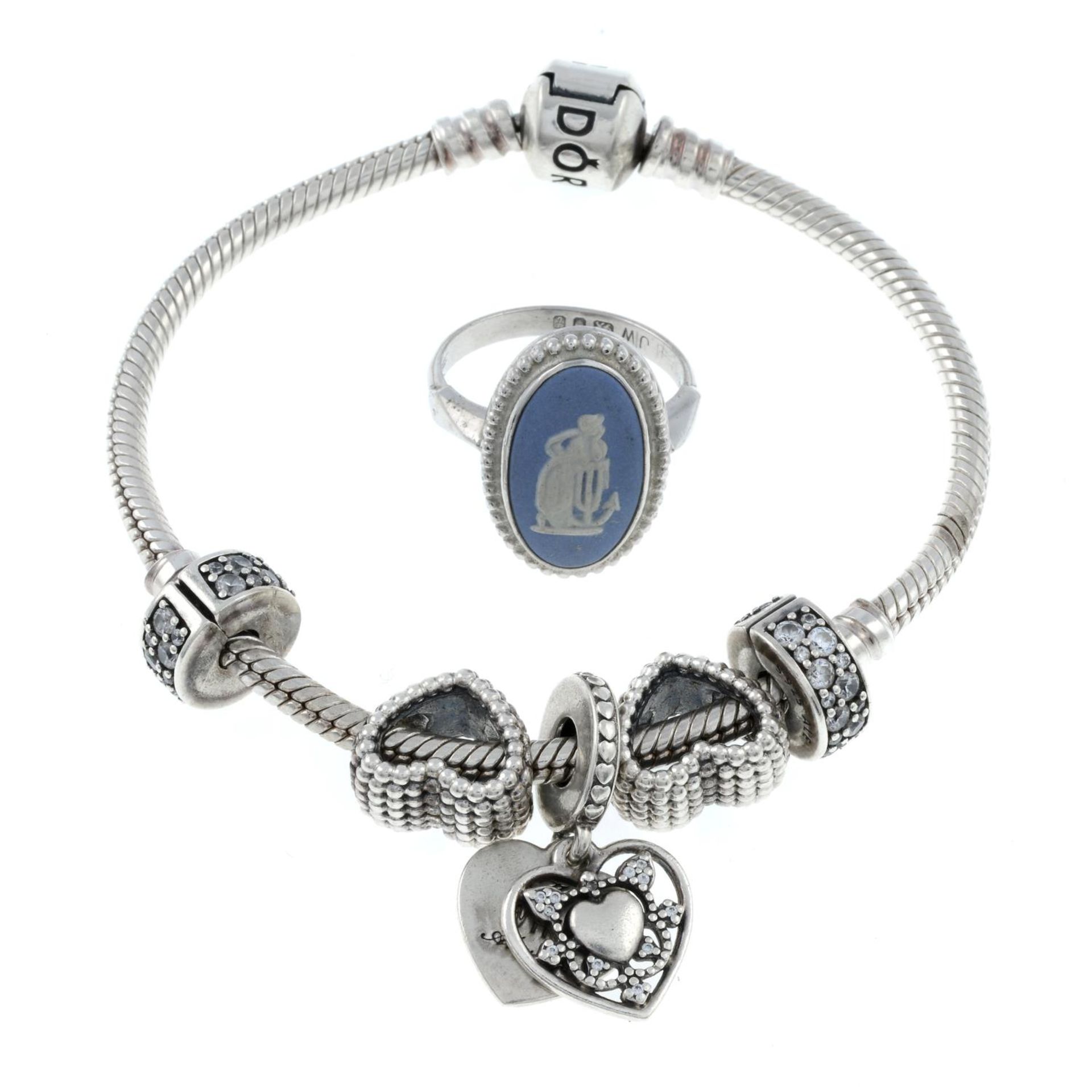 A 'Moments' bracelet, by Pandora and a silver jasperware cameo ring, by Wedgewood.