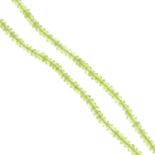 A peridot faceted bead necklace.Clasp stamped 750.Length 39cms.