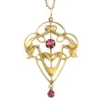 An early 20th century Art Nouveau 9ct gold paste pendant with chain.Stamped 9ct.Length of pendant