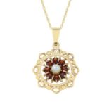 A 9ct gold cultured pearl and garnet pendant,