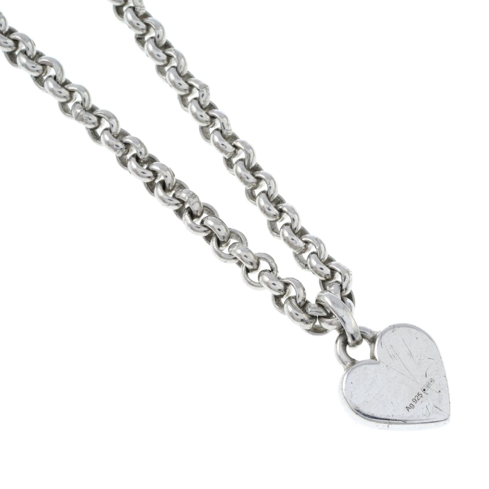 A silver 'Trademark' heart pendant with chain, by Gucci.Signed Gucci.Stamped 925. - Image 2 of 3