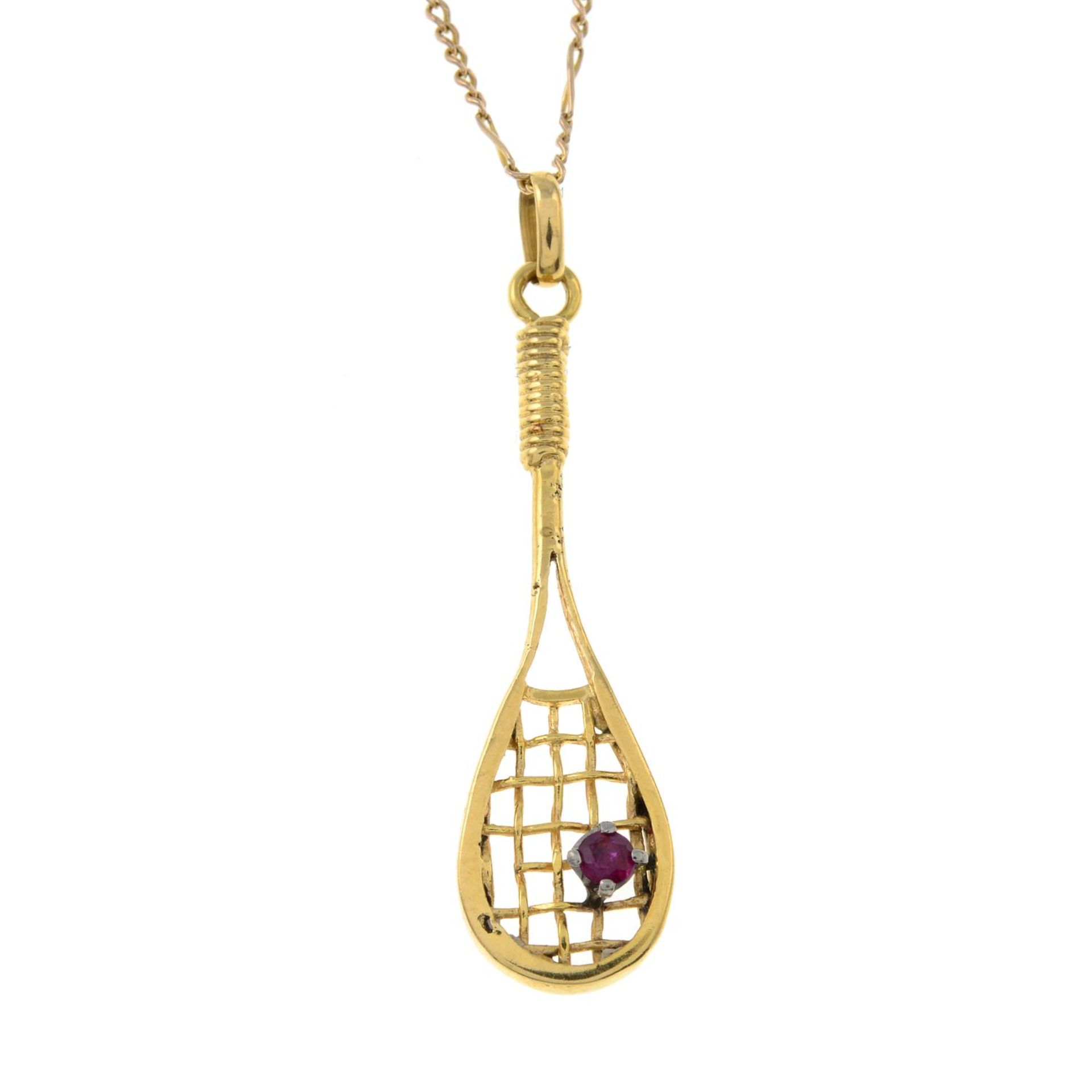 A ruby tennis racket pendant,