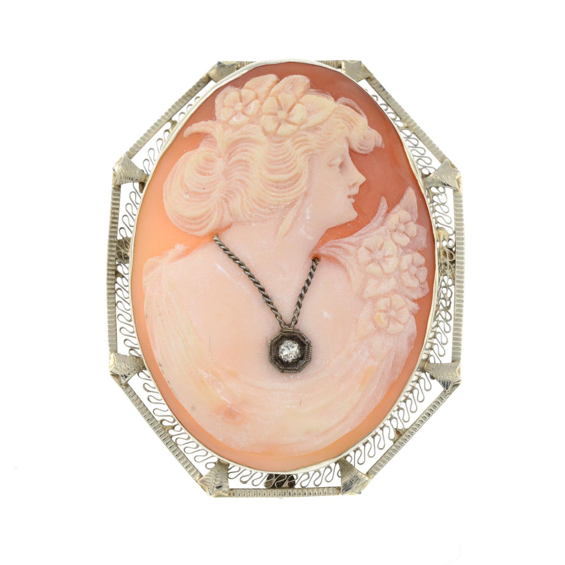 A diamond set cameo brooch.Stamped 14K.