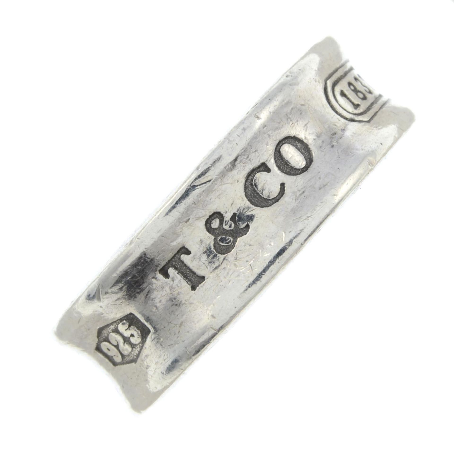 A '1837' band ring, by Tiffany and Co.Signed Tiffany & Co.