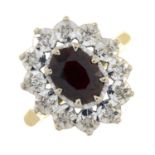 An 18ct gold garnet and diamond ring.Hallmarks for Birmingham, 1972.Ring size N 1/2.