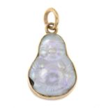 A Buddha-shaped cultured pearl pendant.