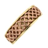 A 9ct gold Celtic knot band ring.Hallmarks for Sheffield.Ring size M.