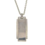 A silver 'Metropolis' pendant,