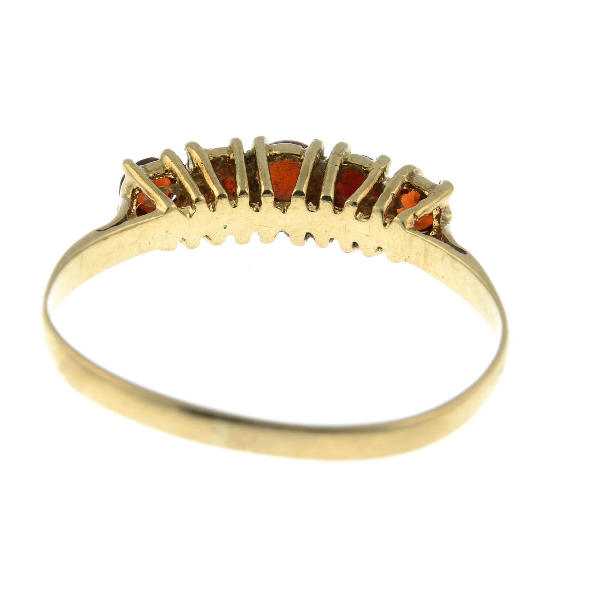 A 9ct gold garnet five-stone ring.Hallmarks for Edinburgh, 1981.Ring size S. - Image 3 of 3