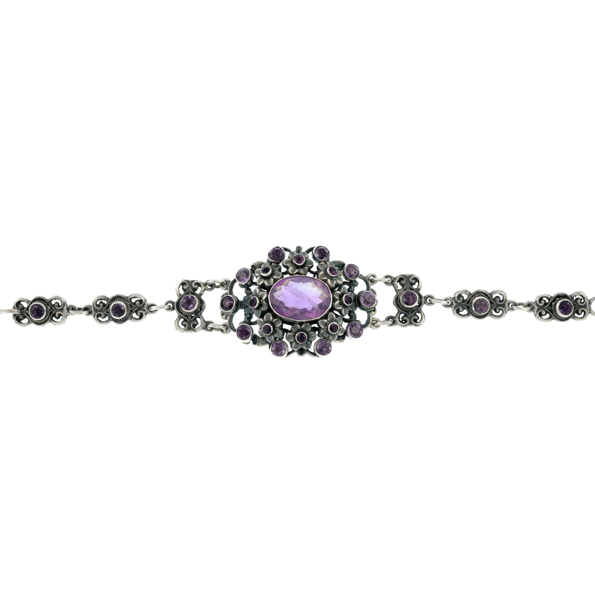 An amethyst bracelet with floral motif, by Zoltan White & Co.Signed Z.W.&Co.