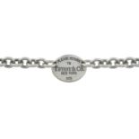 A silver 'Return to Tiffany' bracelet, by Tiffany & Co.Signed Tiffany & Co.