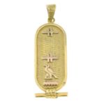 A pendant featuring Egyptian hieroglyphs.Length 3.8cms.