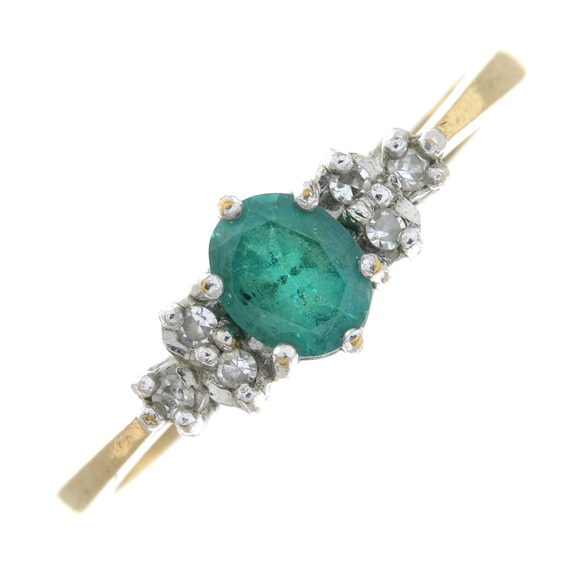 A 9ct gold emerald and diamond ring.