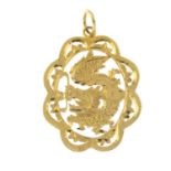 An engraved pendant of a dragon.Stamped 14k.Length 3.2cms.