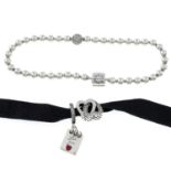 A cubic zirconia set bracelet, suspending two charms, by Pandora.Stamped 925.