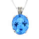 A blue topaz pendant, with chain.Chain stamped 925.Length of pendant 1.7cms.
