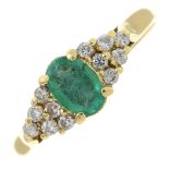 A 9ct gold emerald and diamond dress ring.Estimated total diamond weight 0.10ct.Import marks for