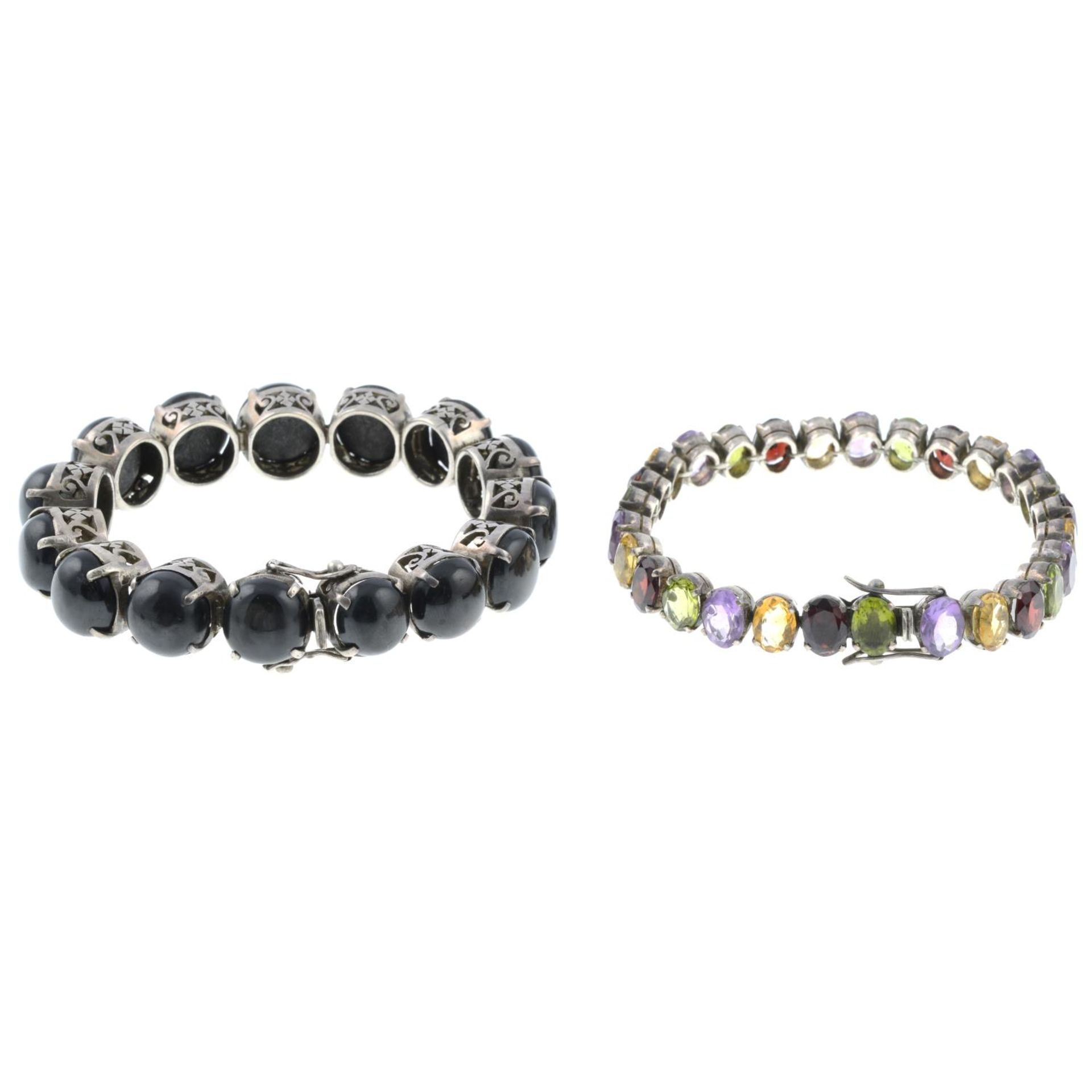 A cats-eye chrysoberyl line bracelet and a multi-gem set bracelet.Lengths 18.5cms. - Image 2 of 2