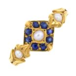 An early 20th century 18ct gold sapphire and split pearl ring.Stamped 18ct.Ring size P.
