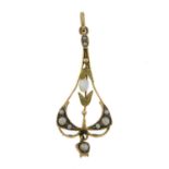 An early 20th century Art Nouveau split pearl and seed pearl pendant.