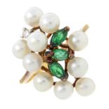 An emerald, cultured pearl and brilliant-cut diamond dress ring.Estimated diamond weight under