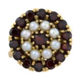 A 9ct gold garnet and split pearl cluster ring.