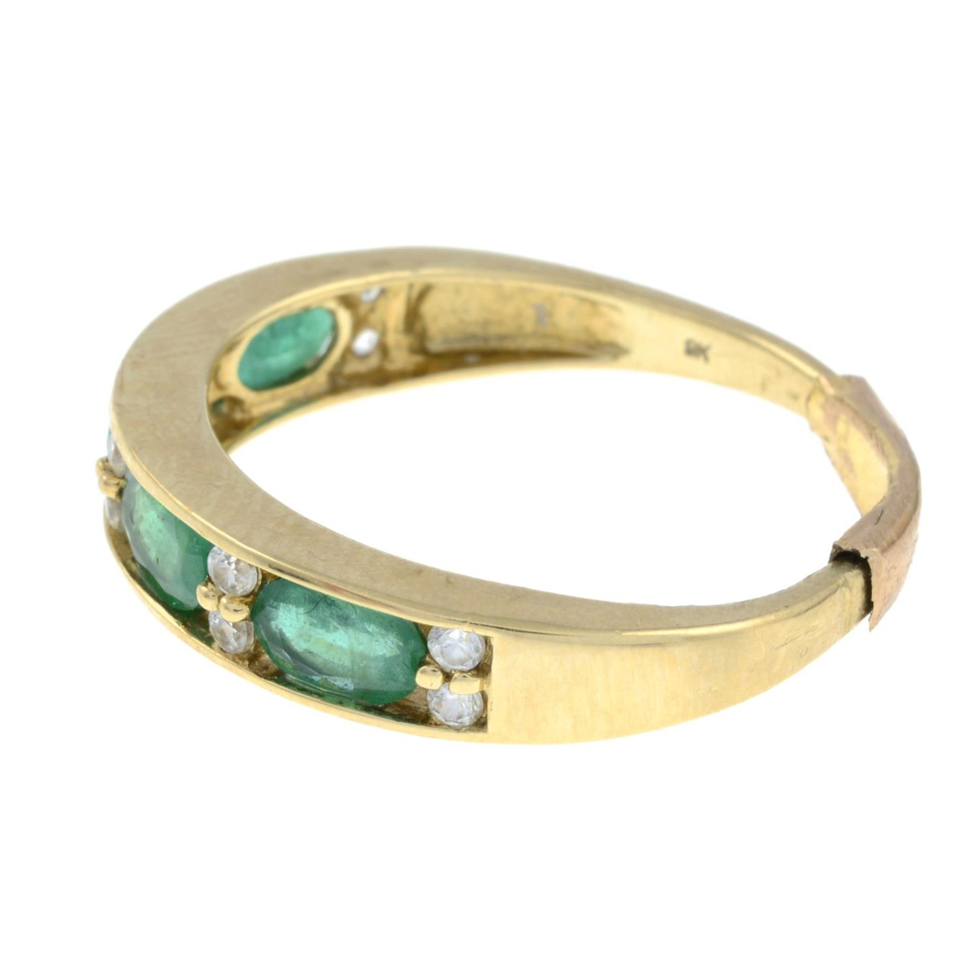 A 9ct gold emerald and colourless gem half eternity ring. - Image 2 of 3