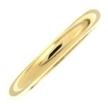 A band ring, by Cartier.Signed Cartier.