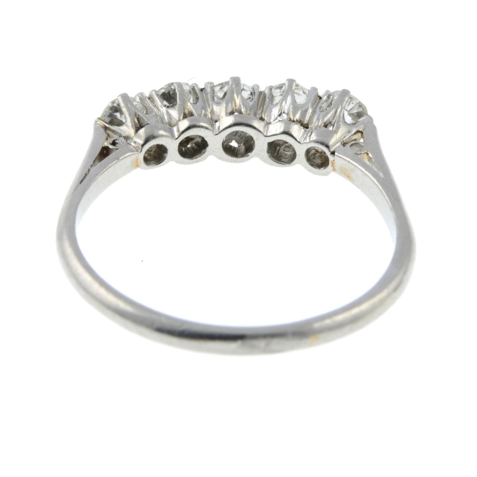 A five stone diamond ring.Estimated total diamond weight 0.19cts, - Image 3 of 3