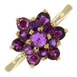 A 9ct gold red spinel cluster ring.Hallmarks for London, 1976.Ring size R1/2.