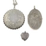 A selection of lockets.Many with marks to indicate silver.