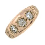 An Edwardian 9ct gold old-cut diamond three-stone ring.Estimated total diamond weight 0.30ct,