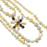 A three-row imitation pearl necklace with multi-coloured paste cross, by Chanel.Signed Chanel.