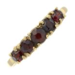 A 9ct gold garnet five-stone ring.Hallmarks for Edinburgh, 1981.Ring size S.