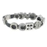 A 'Reflexions' bracelet, with eleven various charms, by Pandora.