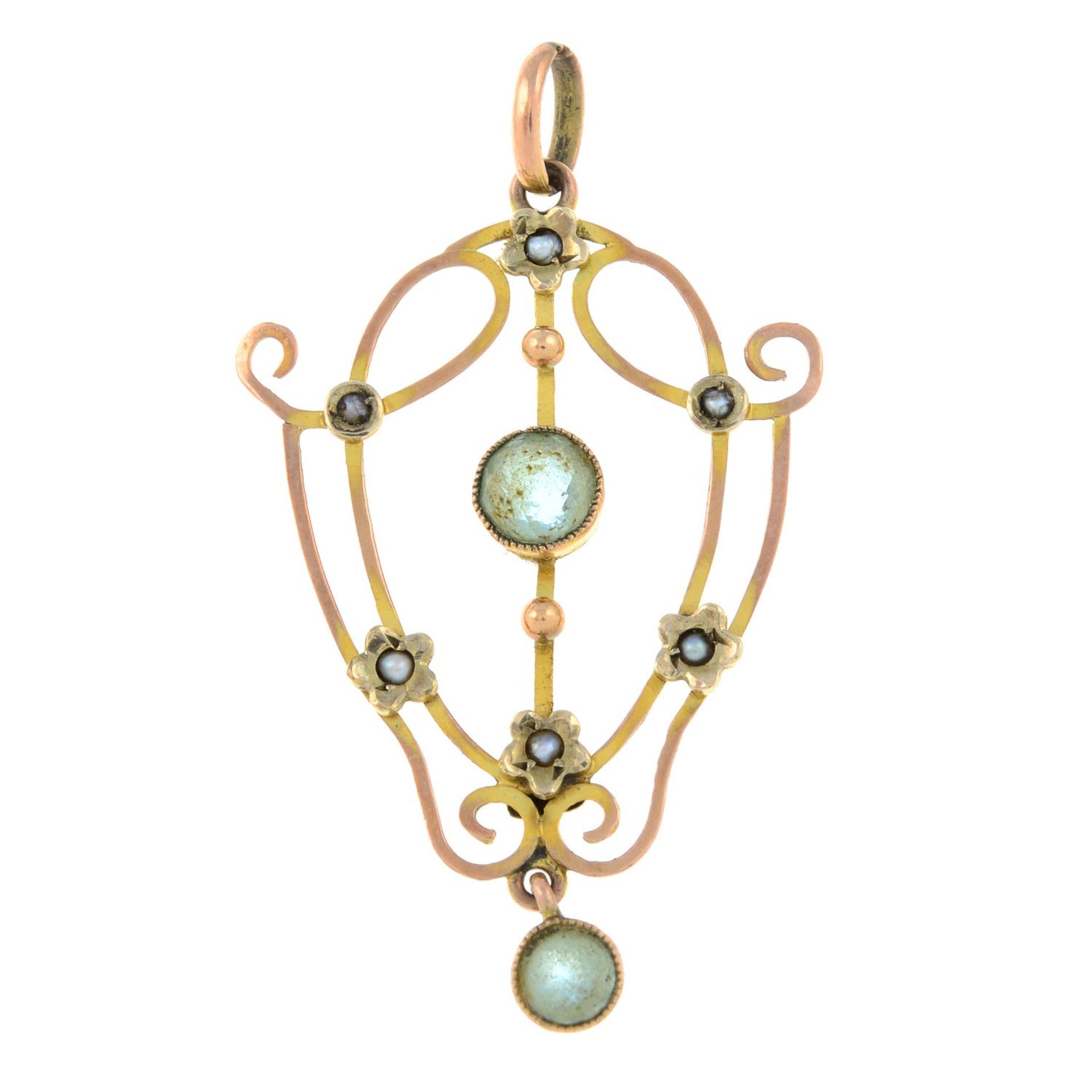 An early 20th century 9ct gold split pearl and blue paste bi-colour openwork pendant.Stamped 9CT.
