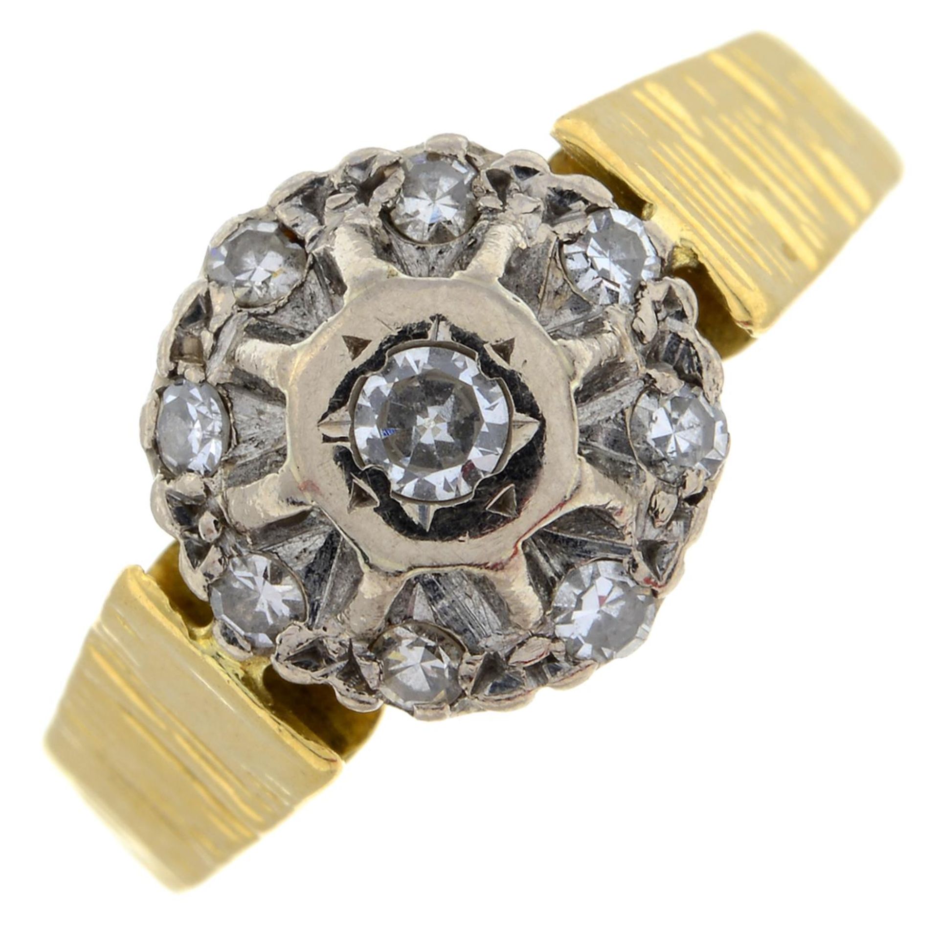 An 18ct gold vari-cut diamond cluster ring.Estimated total diamond weight 0.10ct.