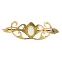 An Art Nouveau gold opal brooch.Length 4.4cms.