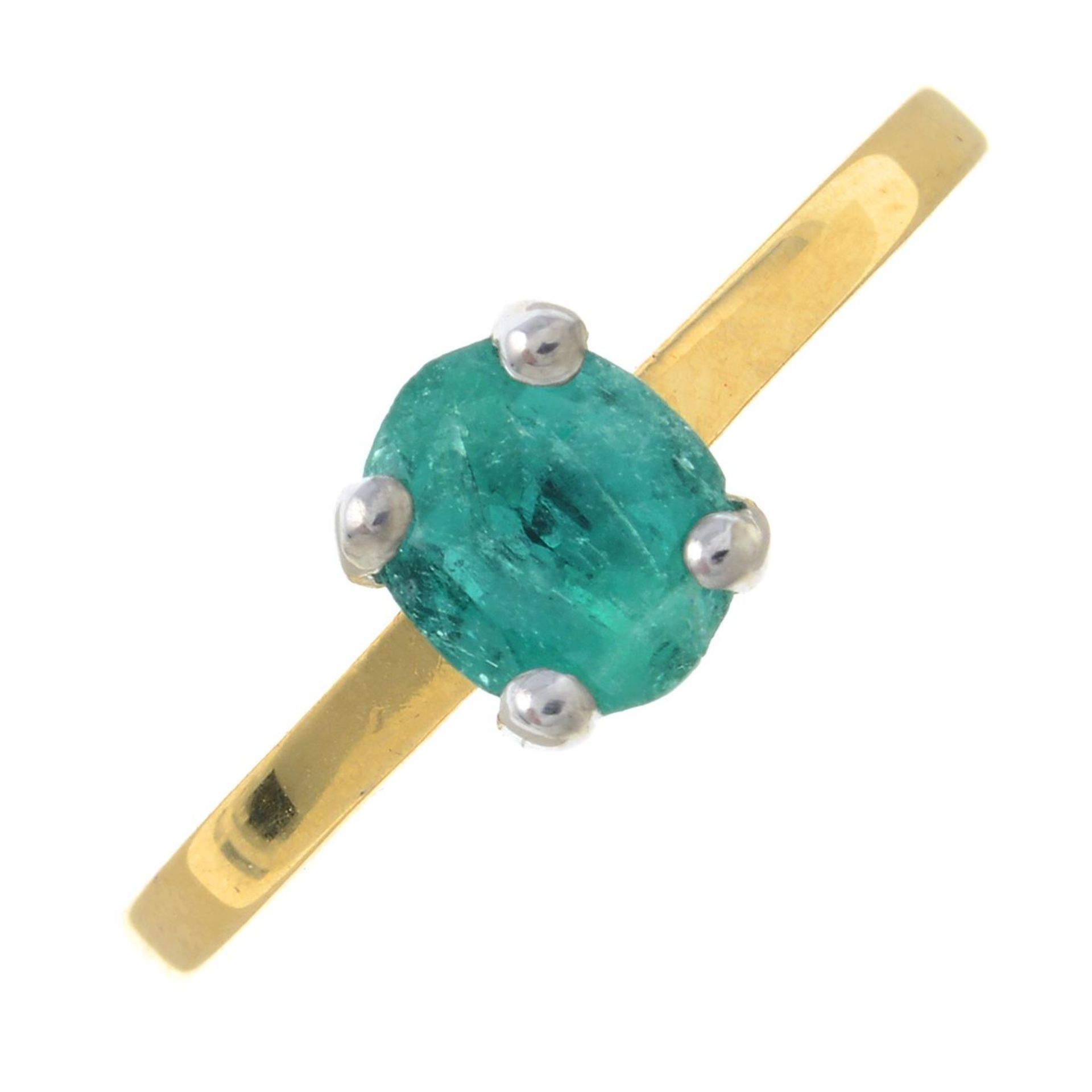 An 18ct gold emerald single-stone ring.Hallmarks for Sheffield, partially indistinct.