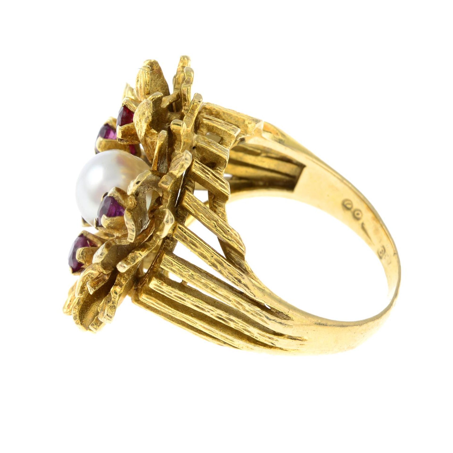 A 1960's 9ct gold cultured pearl and ruby abstract flower dress ring.Hallmarks for London, 1969. - Image 2 of 3