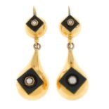 A pair of split pearl and onyx drop earrings.Length 4cms.