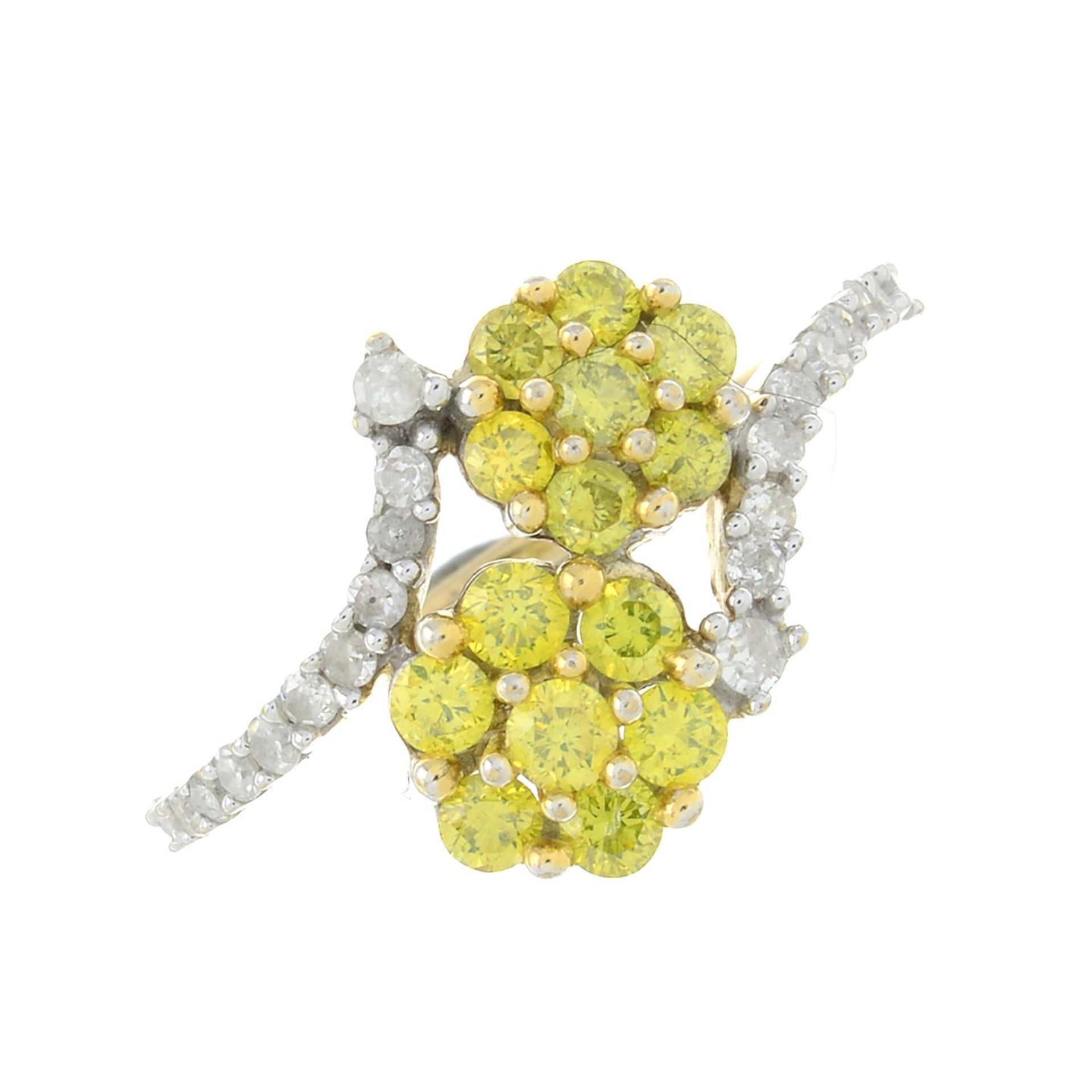 A 9ct gold diamond and yellow diamond dress ring.Estimated total diamond and 'yellow' diamond