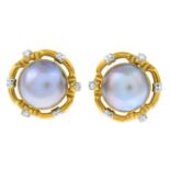 A pair of mabe pearl and diamond earrings.Mabe pearls measuring 15.5 to 16mms.