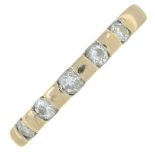 An 18ct gold brilliant-cut diamond half eternity ring.Total diamond weight 0.25ct,