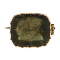 A mid 19th century gold foil-back quartz brooch.Length 2.2cms.